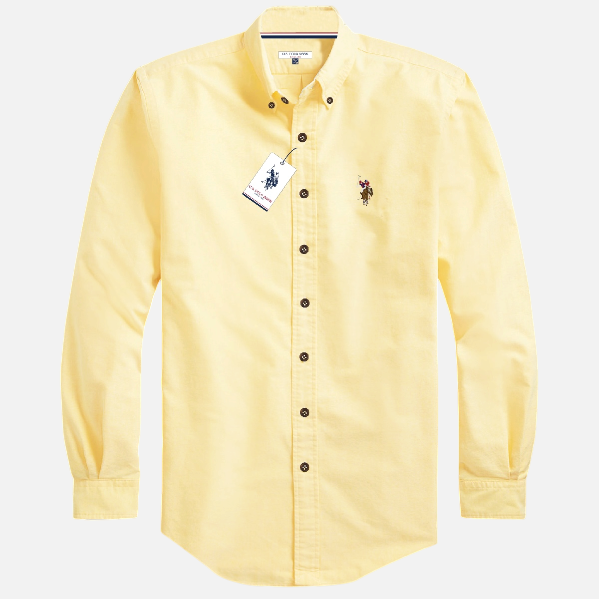 Camisa de manga larga amarilla para hombre de www.treshop.com.co con cuello abotonado y logo bordado en el pecho