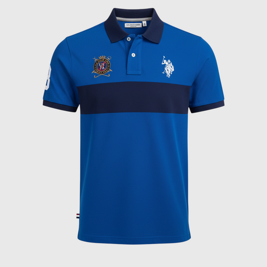 Camisa polo www.treshop.com.co azul real con franja azul marino, logotipo bordado y corte amplio para hombre.