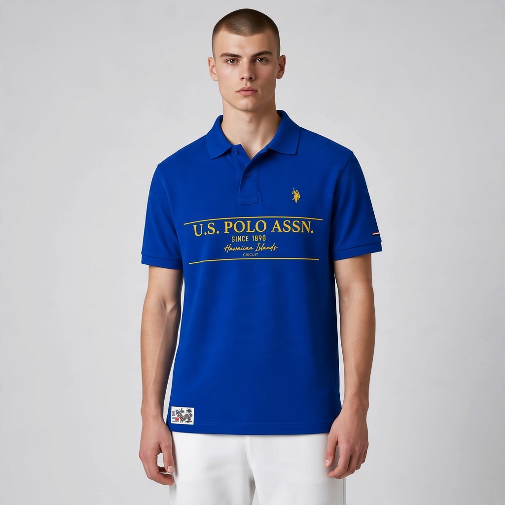Polo azul real de manga corta www.treshop.com.co con estampado gráfico amarillo y logo bordado en el pecho