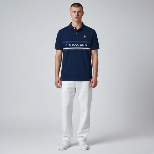 Polo azul marino de algodón piqué con logo bordado y franjas de www.treshop.com.co en ajuste regular
