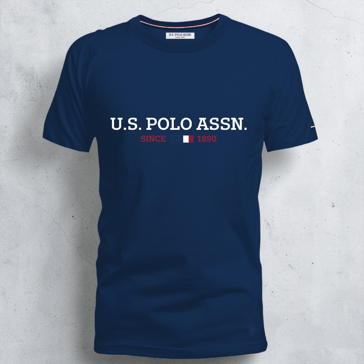 Camiseta azul marino de algodón U.S. POLO ASSN. con estampado frontal y cuello redondo de www.treshop.com.co