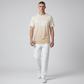 Camiseta www.treshop.com.co U.S. Polo Assn. con degradado crema y arena, logo frontal y corte moderno para hombre.