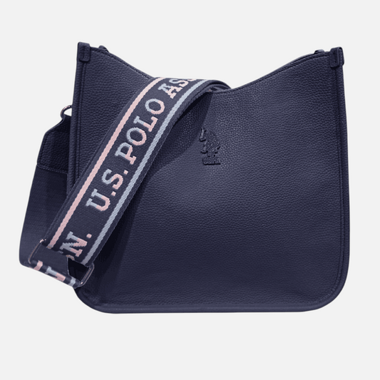 Bolso bandolera www.treshop.com.co azul marino con textura granulada, correa deportiva ajustable y logo grabado.