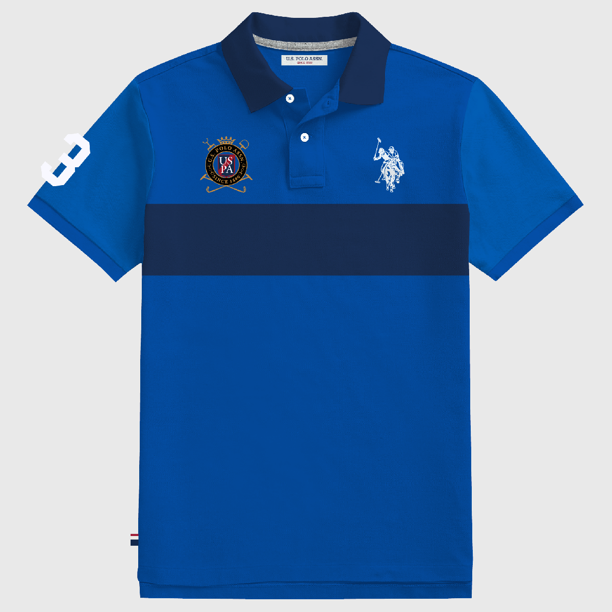 Camisa polo www.treshop.com.co azul real con franja azul marino, logo bordado y corte amplio para hombre