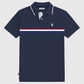Camisa polo azul marino para hombre de www.treshop.com.co con franja tricolor y logotipo bordado en el pecho