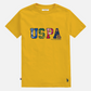 Camiseta amarilla de algodón para hombre www.treshop.com.co con estampado gráfico USPA y logo bordado
