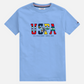 Camiseta azul claro de algodón www.treshop.com.co con estampado gráfico USPA y logo de jugador de polo en el frente