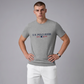 Camiseta gris jaspeado de algodón www.treshop.com.co con logo U.S. POLO ASSN. y estampado frontal para hombre