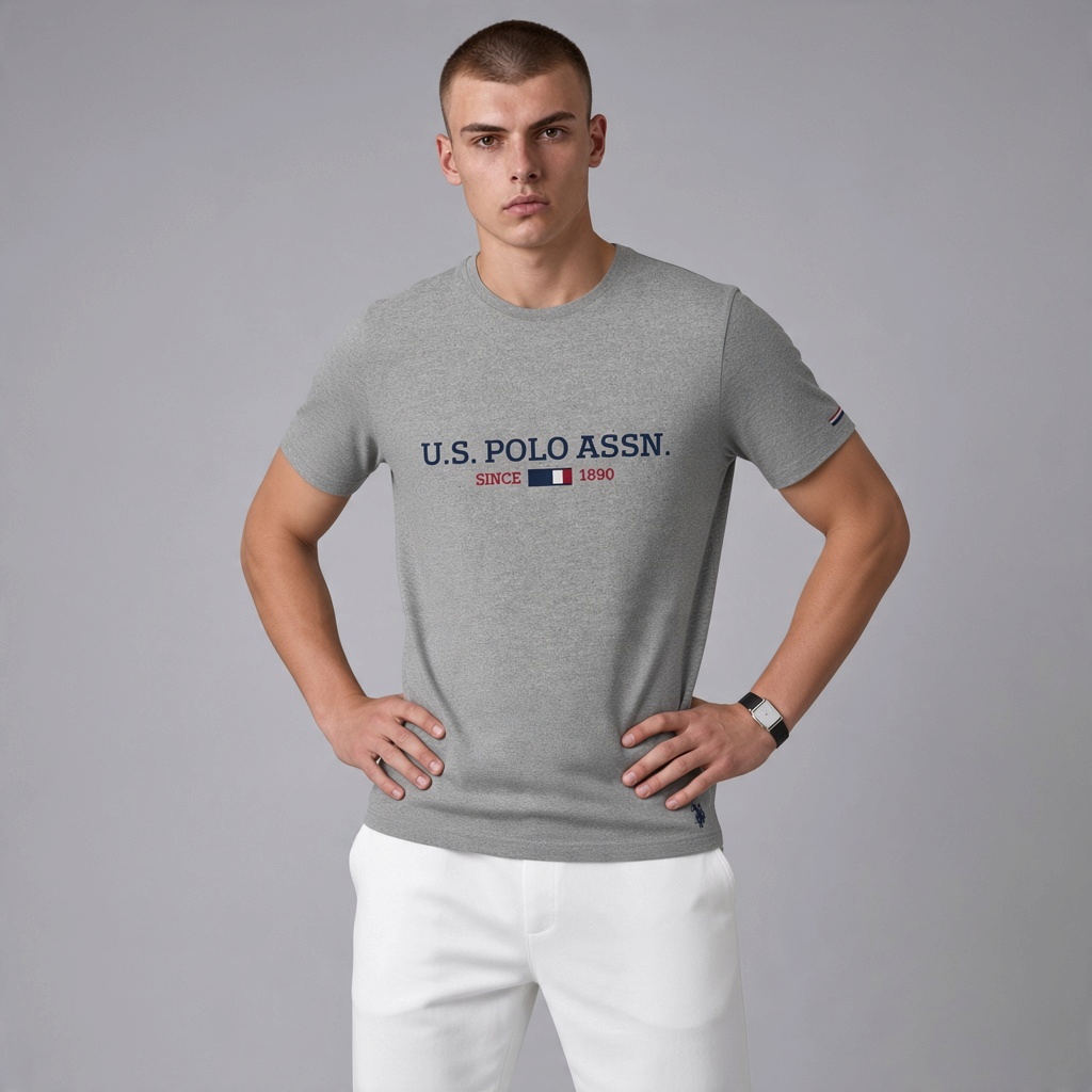 Camiseta gris jaspeado de algodón www.treshop.com.co con logo U.S. POLO ASSN. y estampado frontal para hombre
