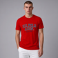 Hombre vistiendo camiseta roja de algodón U.S. Polo Assn. con logo estampado y cuello redondo