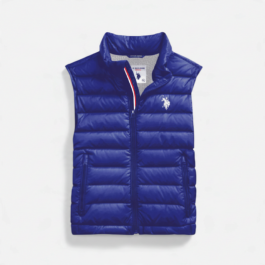 Chaleco acolchado azul para hombre de www.treshop.com.co con cierre de cremallera y logo bordado en el pecho