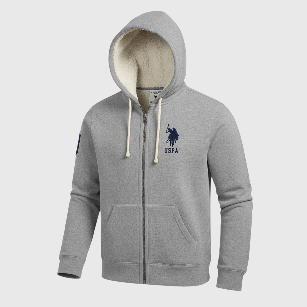Chaqueta gris con capucha y forro de borrego de www.treshop.com.co con cremallera y logo bordado en el pecho