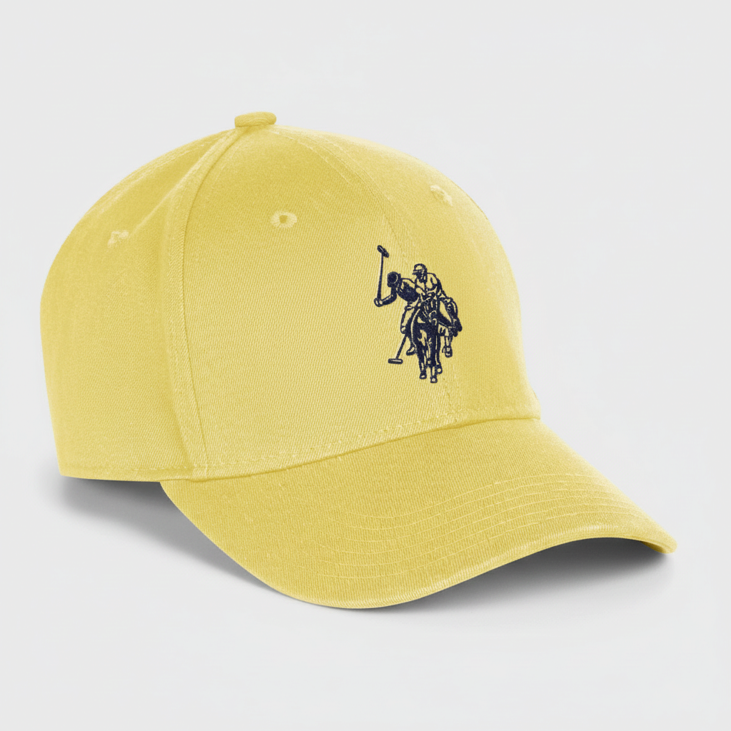 Gorra deportiva www.treshop.com.co amarilla de algodón con visera curva y bordado de jugador de polo en contraste