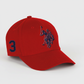 Gorra roja U.S. Polo Assn. de www.treshop.com.co con bordado azul en el frente y número 3 en el lateral