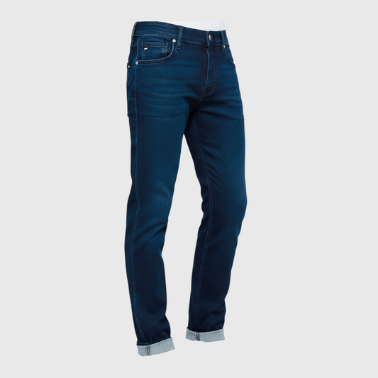 Pantalones de mezclilla azul oscuro para hombre de www.treshop.com.co con corte moderno y costuras reforzadas