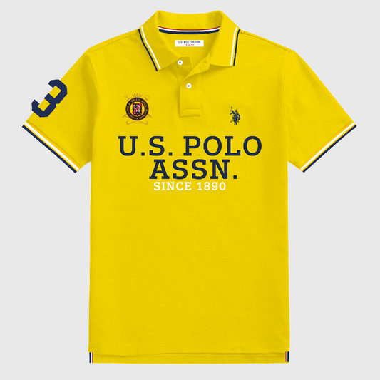 Polo amarillo de algodón para hombre de www.treshop.com.co con logotipo bordado, estampado gráfico y número 3
