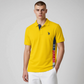 Camisa polo amarilla de algodón U.S. POLO ASSN. de www.treshop.com.co con panel lateral gráfico y logo bordado