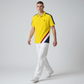 Modelo vistiendo polo amarillo U.S. Polo Assn. de www.treshop.com.co con detalles en azul, blanco y logo bordado
