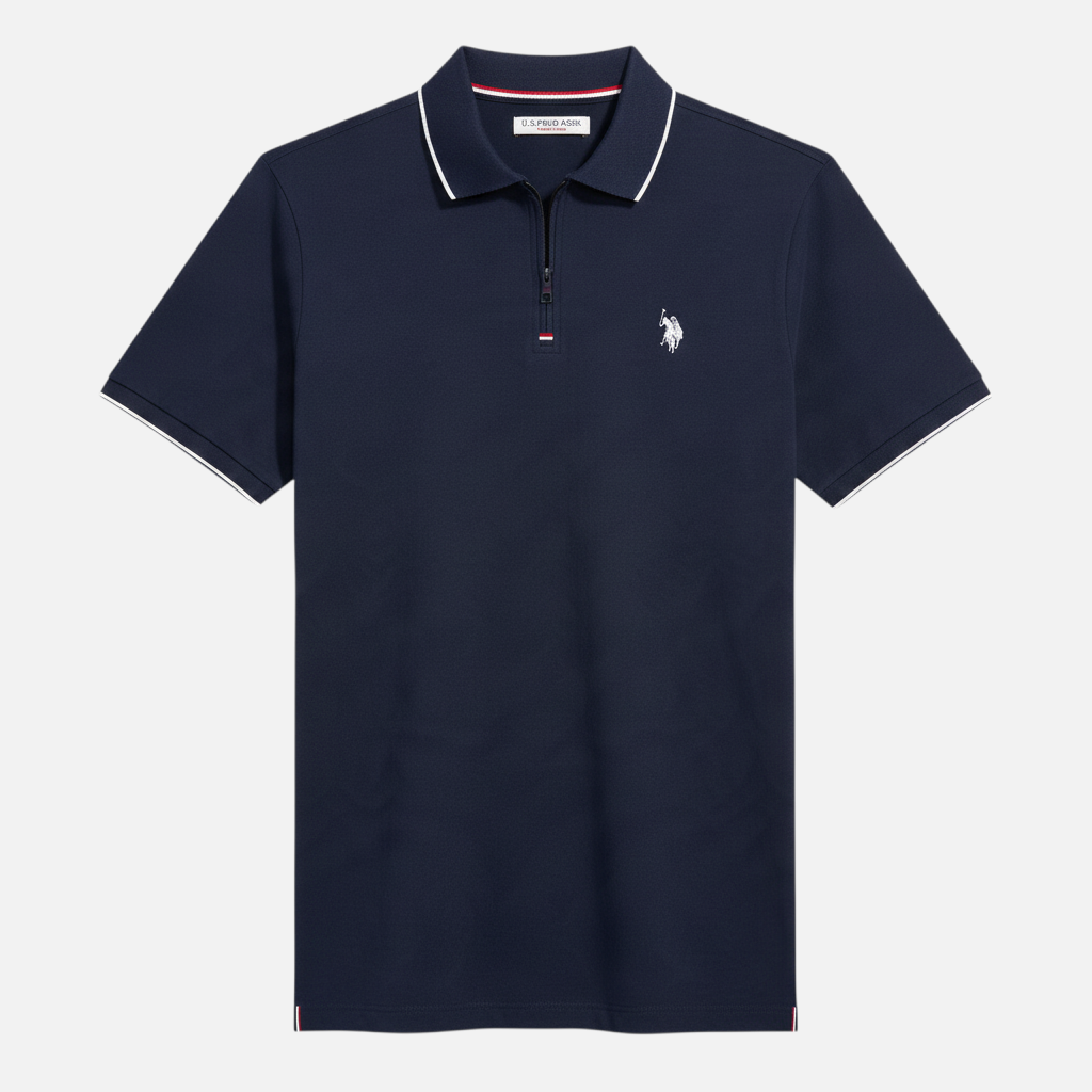 Polo azul marino www.treshop.com.co con cierre de cremallera, detalles blancos en cuello y logo bordado en el pecho