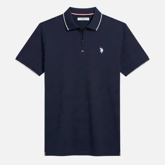 Polo azul marino www.treshop.com.co con cierre de cremallera, detalles blancos en cuello y logo bordado en el pecho