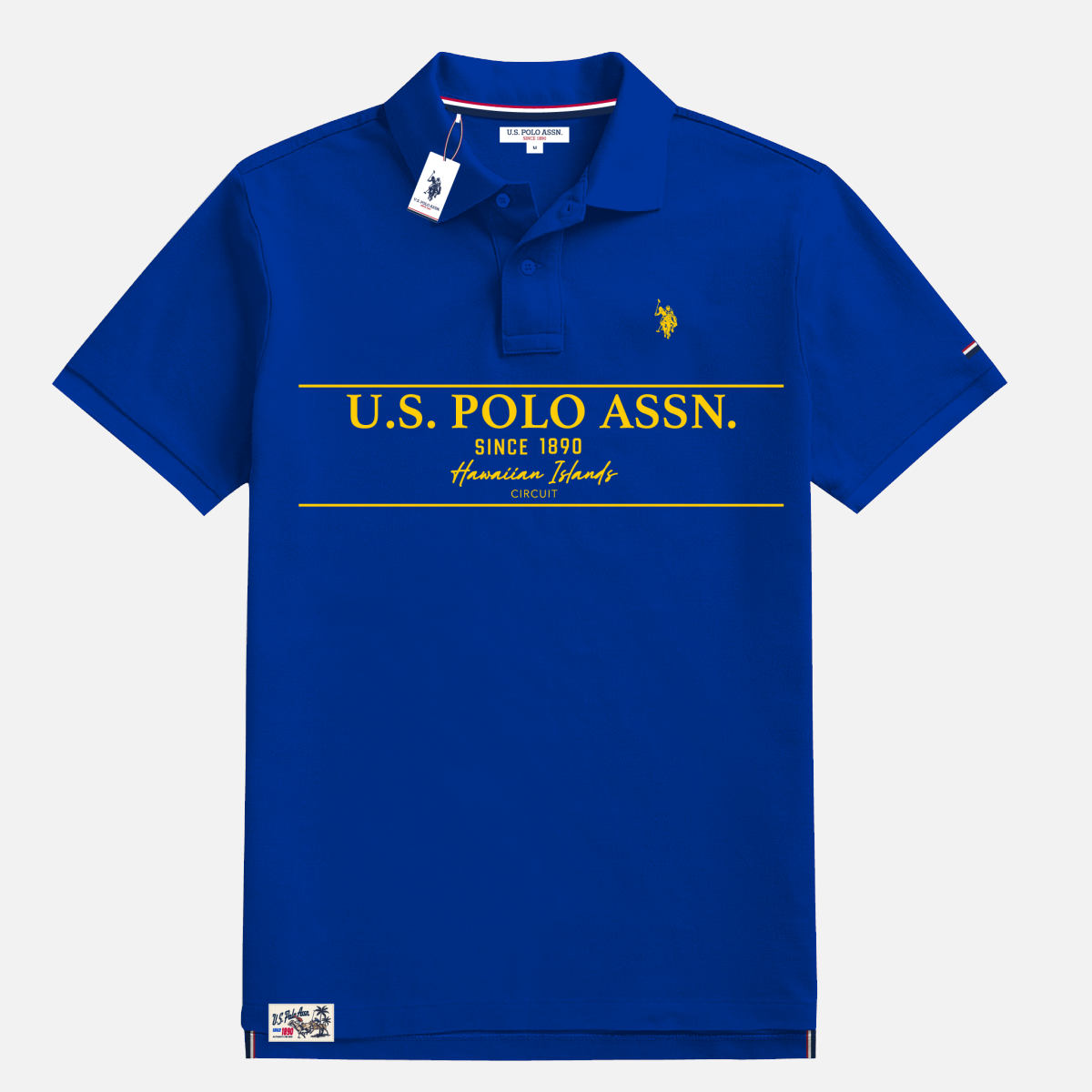 Polo azul real U.S. POLO ASSN. de www.treshop.com.co con estampado gráfico amarillo y logo bordado en el pecho