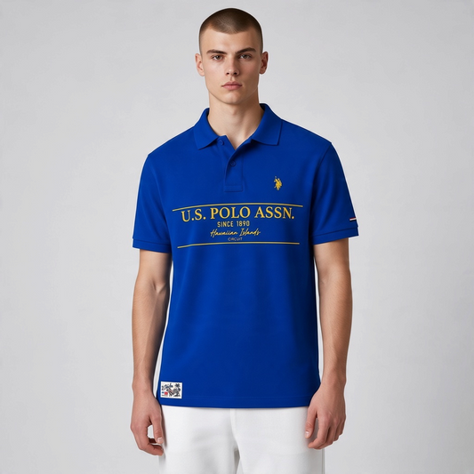 Polo azul real de manga corta www.treshop.com.co con estampado gráfico amarillo y logo bordado en el pecho