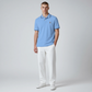 Hombre vistiendo polo azul claro de algodón U.S. POLO ASSN. de www.treshop.com.co con detalles en cuello y mangas