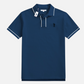 Polo azul marino para hombre de www.treshop.com.co con detalles en blanco en cuello y mangas y logo bordado