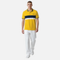 Modelo vistiendo polo amarillo U.S. Polo Assn. de www.treshop.com.co con franjas azul marino y blanco y cuello logo