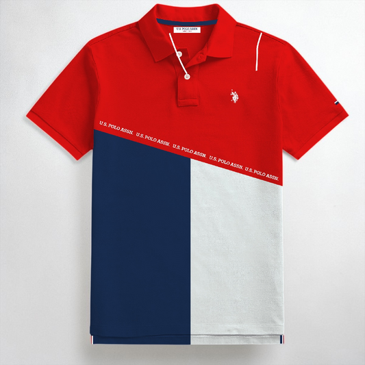 Polo U.S. POLO ASSN. de www.treshop.com.co con diseño tricolor en bloques rojo, azul marino y blanco y logo bordado.