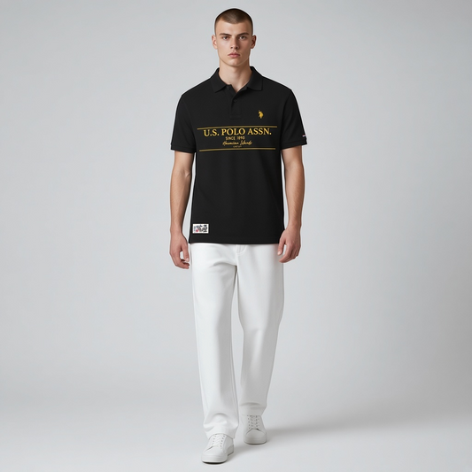 Polo negro de algodón www.treshop.com.co con estampado gráfico amarillo y logo bordado, corte amplio para hombre