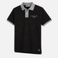 Camiseta polo negra www.treshop.com.co con cuello y puños grises texturizados y logo bordado U.S. Polo Assn.