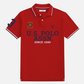 Polo rojo de algodón piqué www.treshop.com.co con logo bordado, estampado frontal y detalles en cuello y mangas