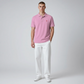 Hombre vistiendo polo rosa de algodón U.S. POLO ASSN. de www.treshop.com.co con detalles en cuello y logo bordado